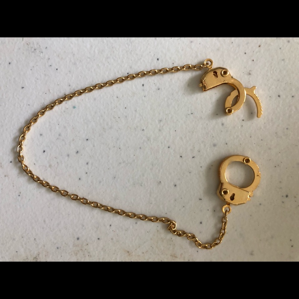 Gold handcuffed anklet